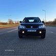 Suzuki Grand Vitara 1.6 De luxe - 4