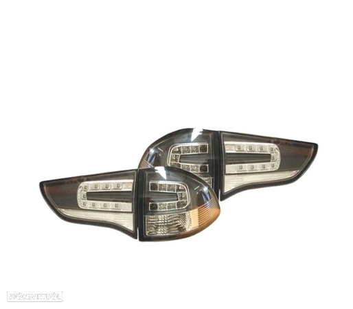 FAROLINS PARA MITSUBISHI MONTERO SPORT 09 LED PRETO - 3