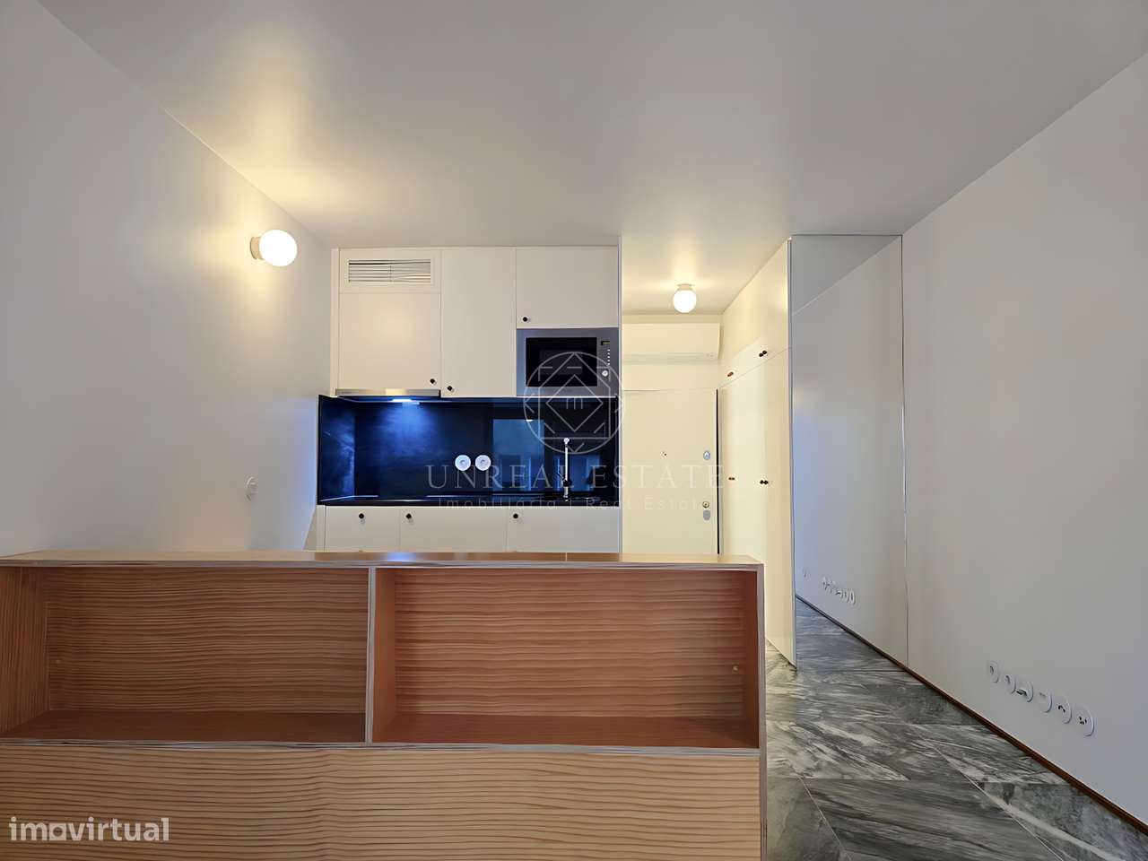 Apartamento T0 , novo, inserido em um edifício totalmente remodelado n-49