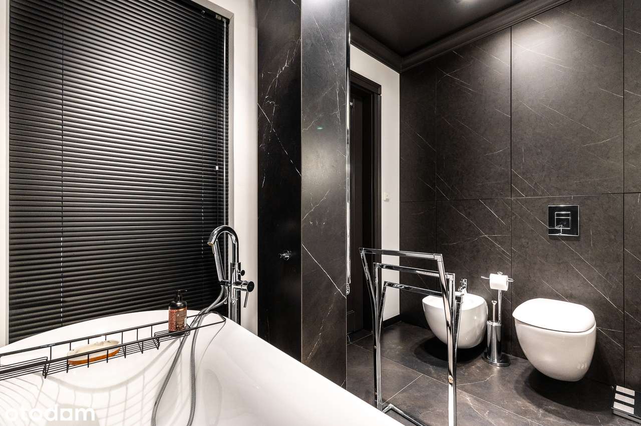 Apartament, który nie próbuje się podobać. On po prostu robi wrażenie.-11