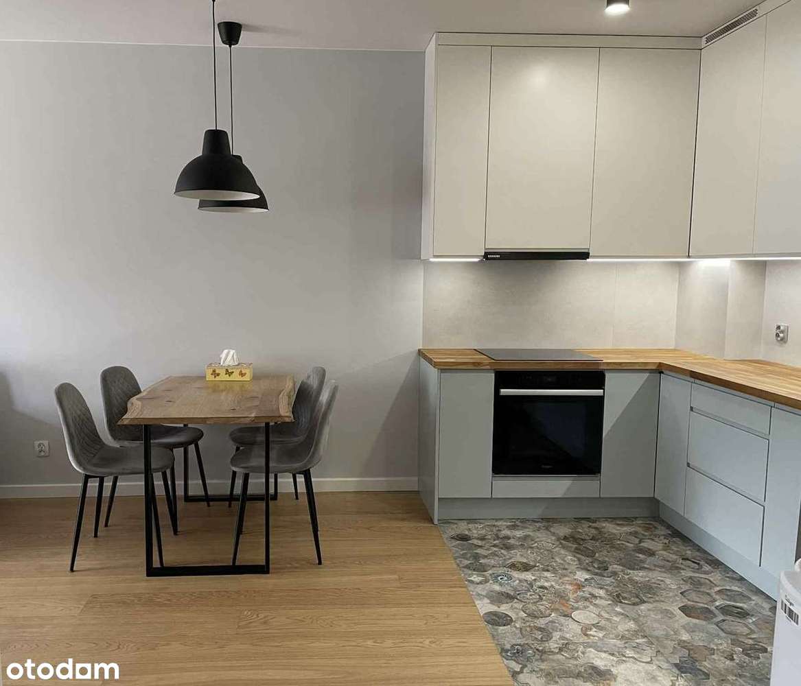 Mieszkanie z ogródkiem i miejscem postojowym w cenie-0