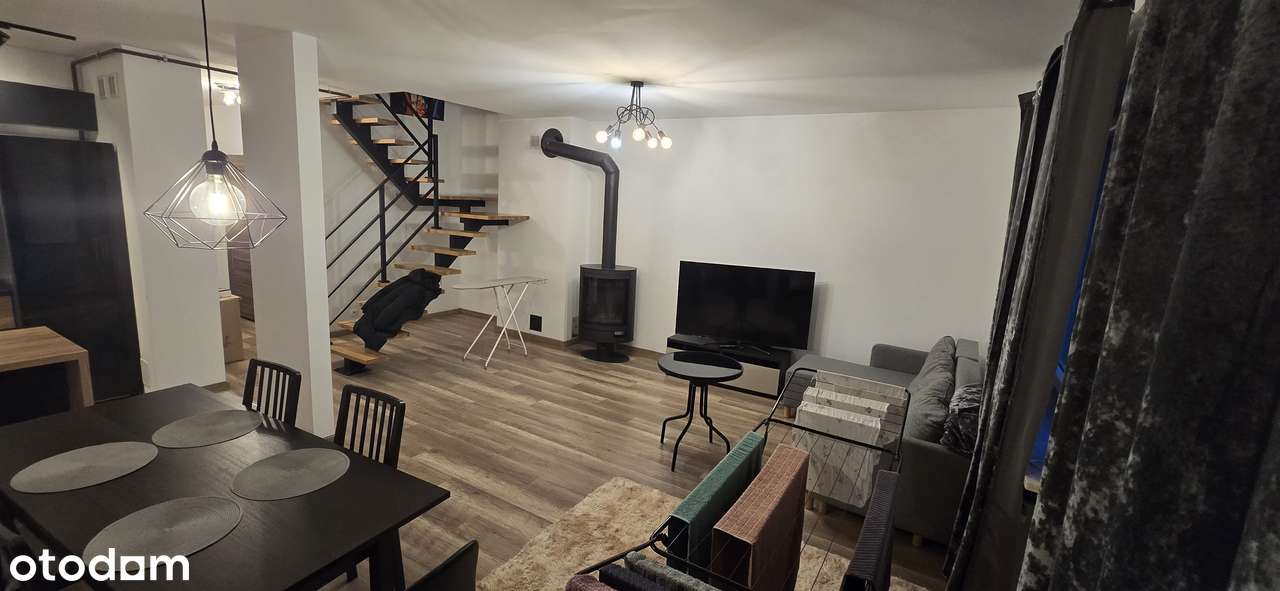 Dwupoziomowe mieszkanie z kominkiem - Pełny obrazek: 4/9