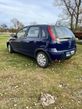 Opel Corsa 1.2 16V Enjoy - 1