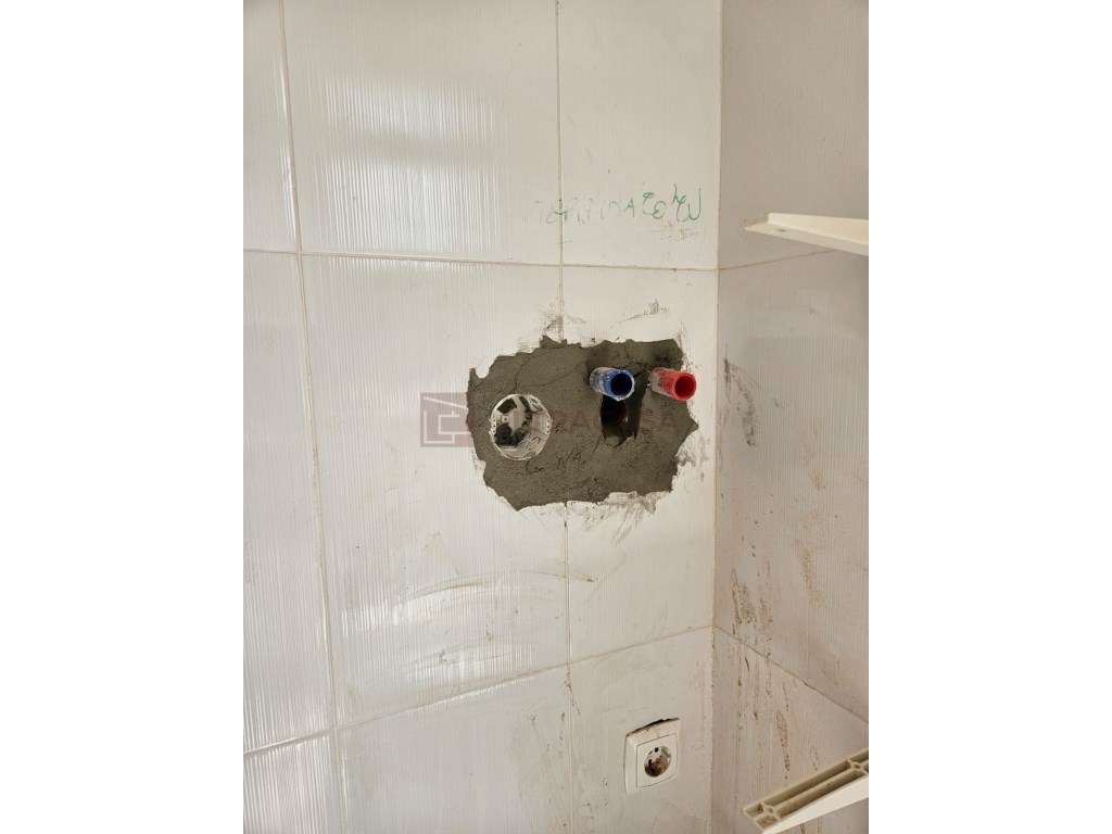 T0 Remodelado com Logradouro no Centro da Amadora-44