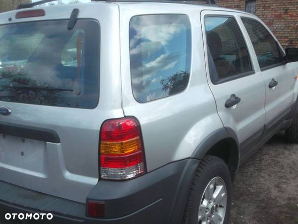 FORD MAVERICK MAZDA TRIBUTE   PODSZYBIE LEWE oryginal czesci - 11