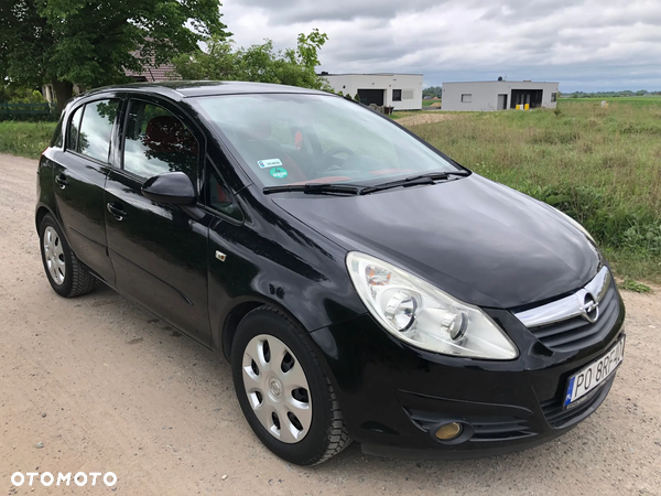 Opel Corsa 1.2 16V Enjoy - 11