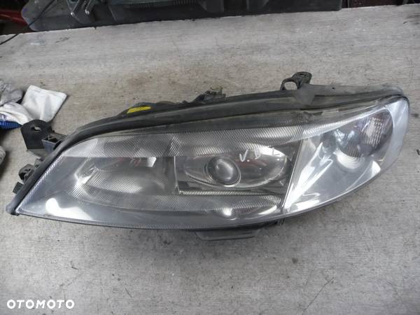 OPEL VECTRA B LIFT LAMPA REFLEKTOR XENON LEWY PRZÓD PRZEDNIA LEWA - 1