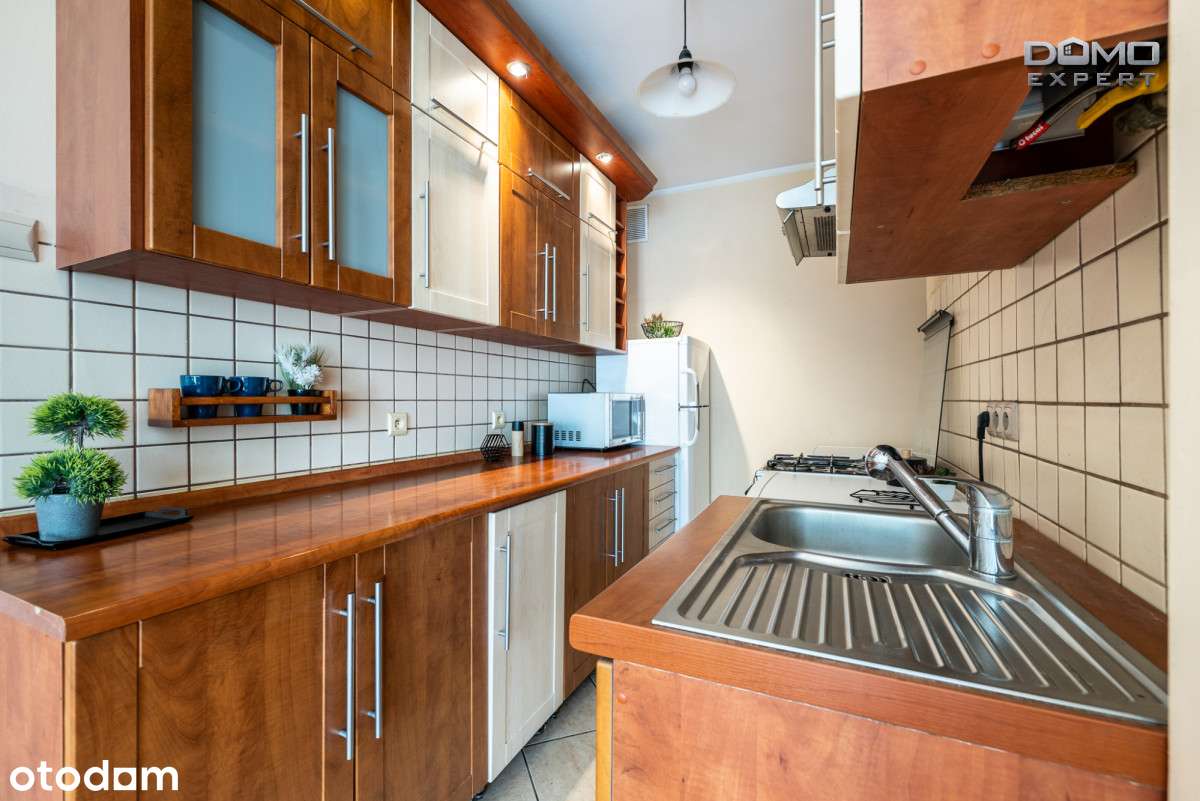 Trzy pokoje z balkonem w centrum-1