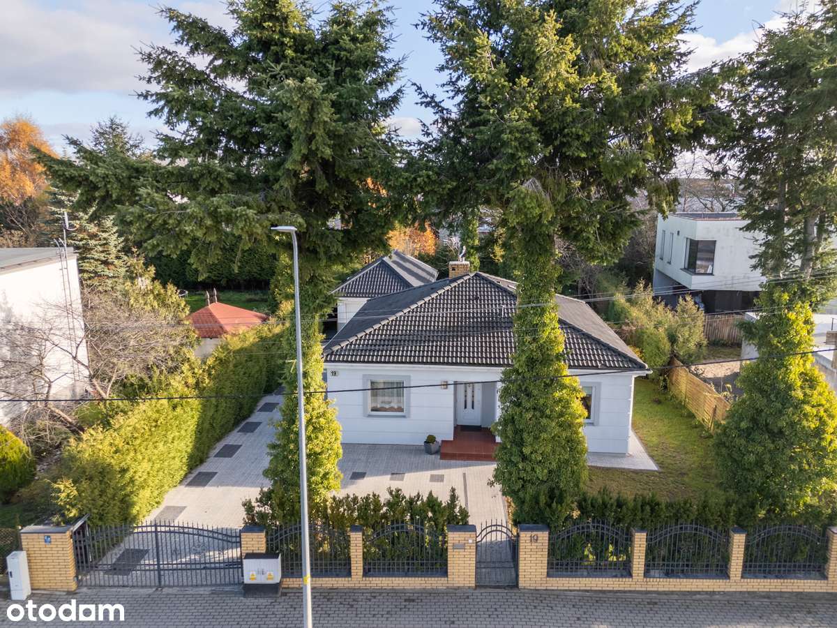 Komfortowy dom z ogrodem i niezależnym garażem-1