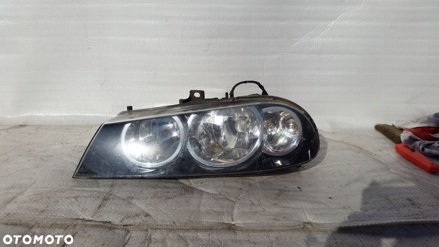 LAMPA LEWA/PRAWA ALFA ROMEO 60695646 - 1