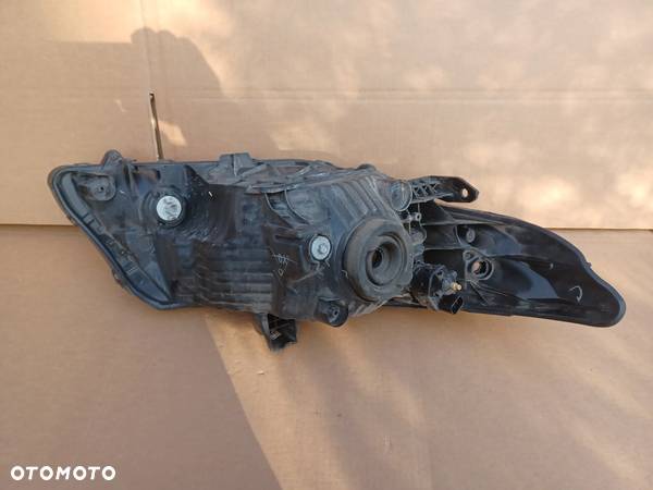 Lampa przednia lewa Honda City oryg P7876 - 4