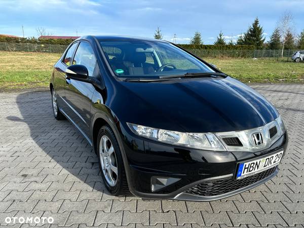 Honda Civic 1.4 i-VTEC Elegance - 11