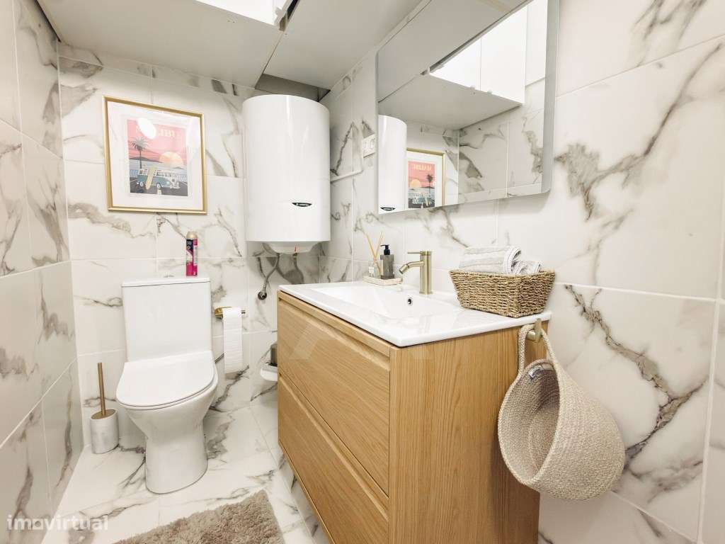 Apartamento T2 renovado e mobilado em Massamá com 107 m² e arrecadação-15