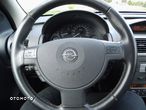 Opel Corsa 1.2 16V Enjoy - 22
