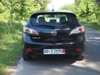 Mazda 3 2.0 Exclusive + - 14