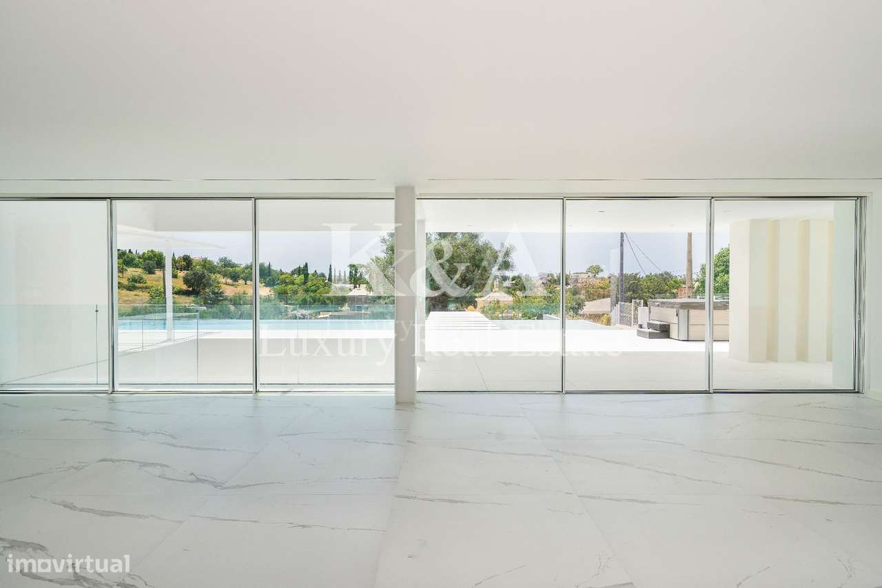 Moradia V6 contemporânea com vistas panorâmicas no Triângulo Dourado,-15