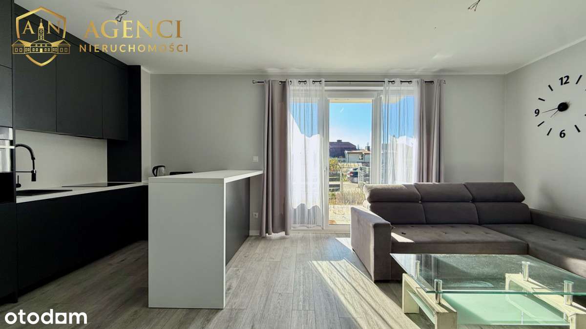 Komfortowe mieszkanie bezczynszowe z ogródkiem-0