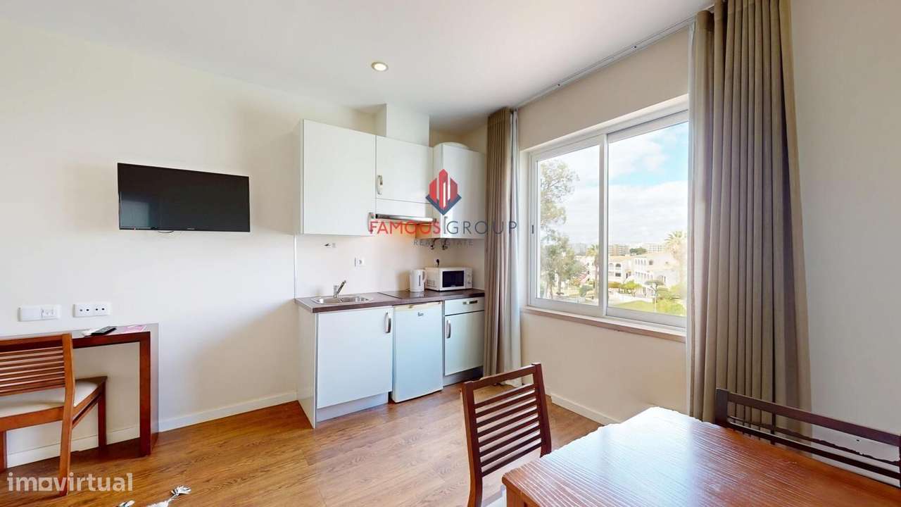 Apartamento T1 em condomínio fechado na Praia da Rocha - Grande imagem: 4/27