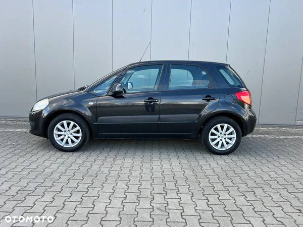 Suzuki SX4 1.6 GLX / Comfort - 9