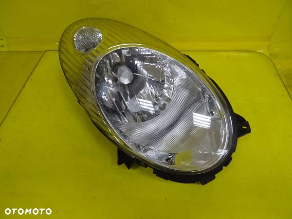 REFLEKTOR LAMPA PRAWA NISSAN MICRA K12 NR305 - 1