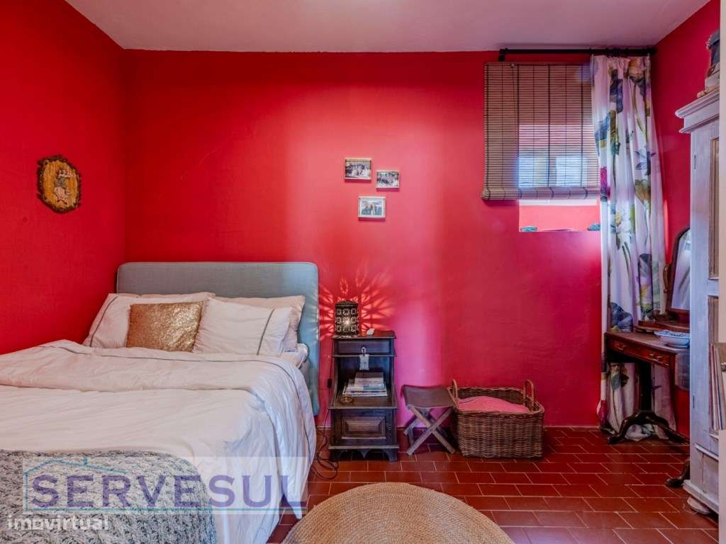 Charmosa moradia de 2 quartos de 121 m², inserida num terreno com 2...-14