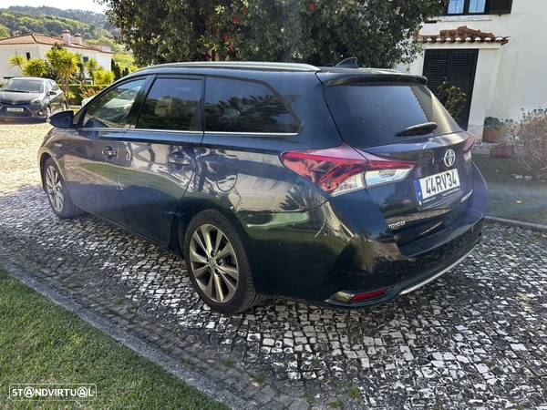 Toyota Auris Touring Sports 1.8 HSD Exclusive+Skyview - 11