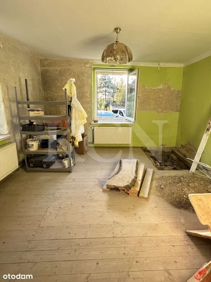 Dwa mieszkania w domu wielorodzinnym-8