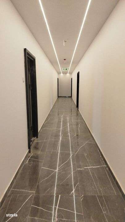 2 camere luminos, Bloc boutique, lift –5 min Rond OMV-10