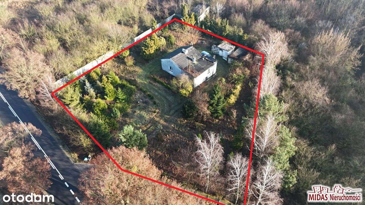 Dom do remontu na ładnej działce-0