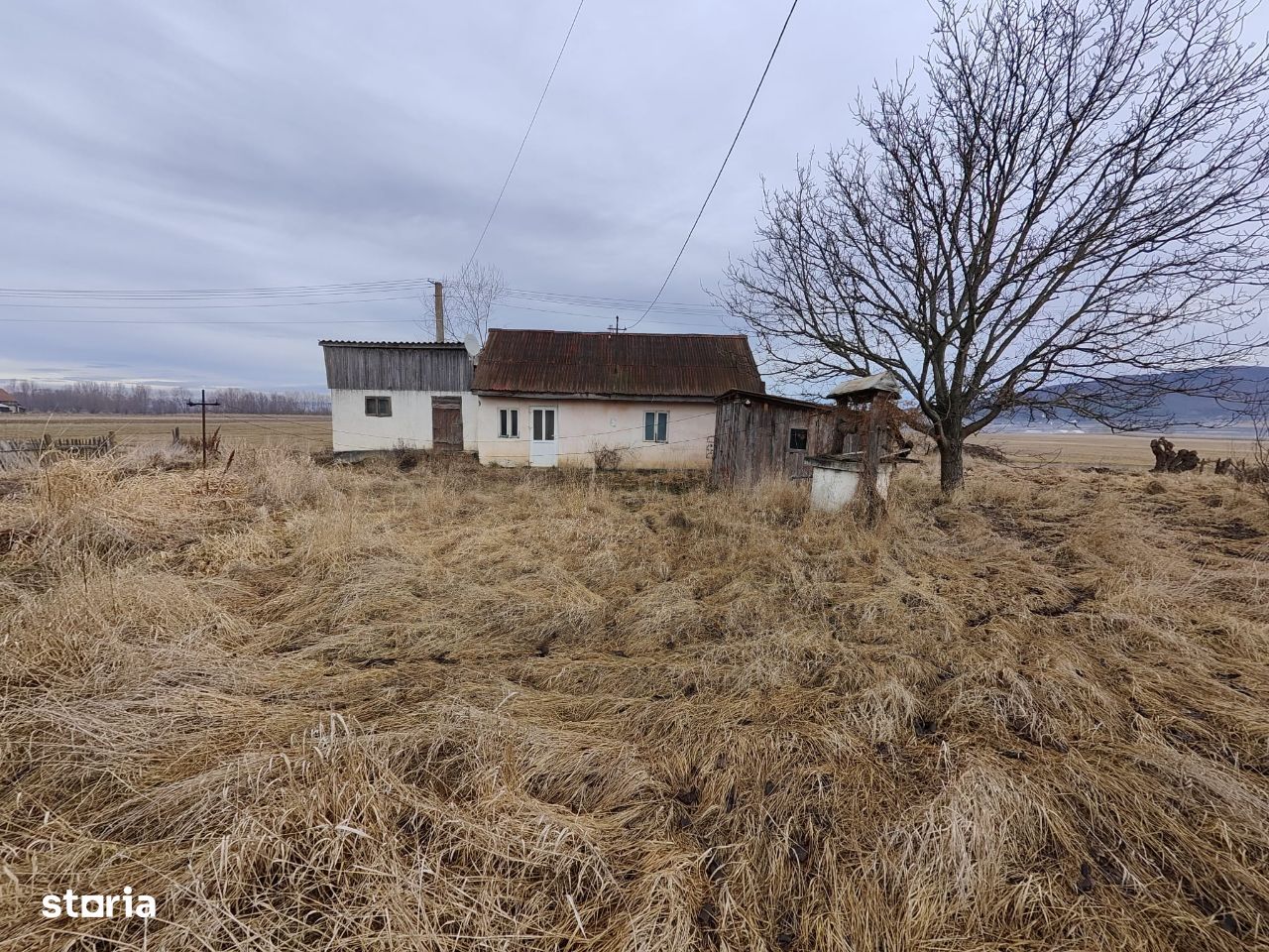 Teren si casa veche de vanzare in Bacel, 1220 mp, cu utilitati