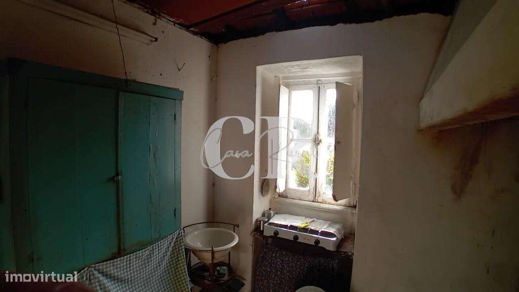 Moradia em pedra em Figueiró dos Vinhos com terreno e poço de água-9