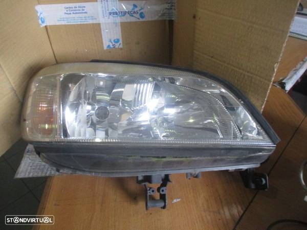 Farol 89100055 OPEL ZAFIRA A 2004 DRT H1H7 VALEO - 1