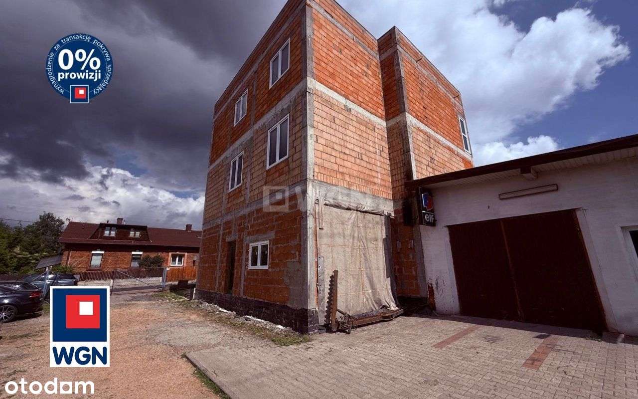 Budynek handlowo-usługowy z częścią mieszkalną sta-9