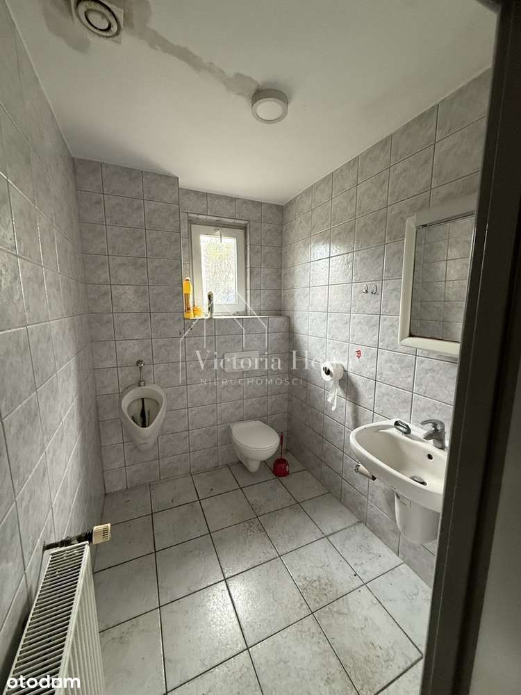 Teren usługowy z zabudowaniami.-18