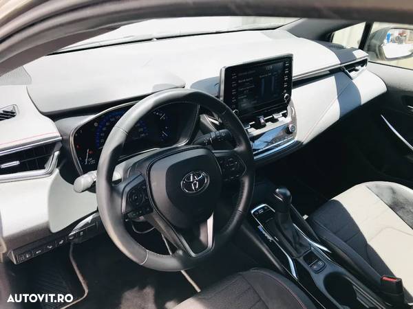 Toyota Corolla 1.8 HSD Exclusive interior Negru - 18