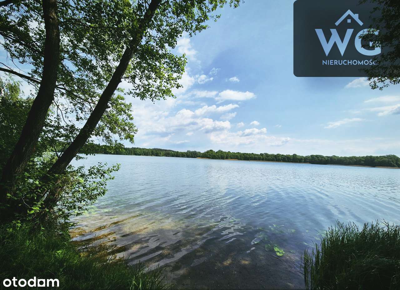 Wyjątkowa działka nad jeziorem – zjawiskowy widok, cisza i las!-9