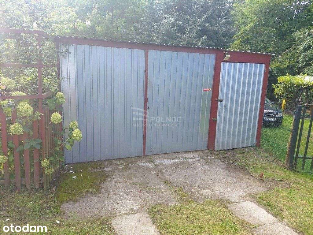 Mieszkanie dwupoziomowe z ogrodem i garażem-16