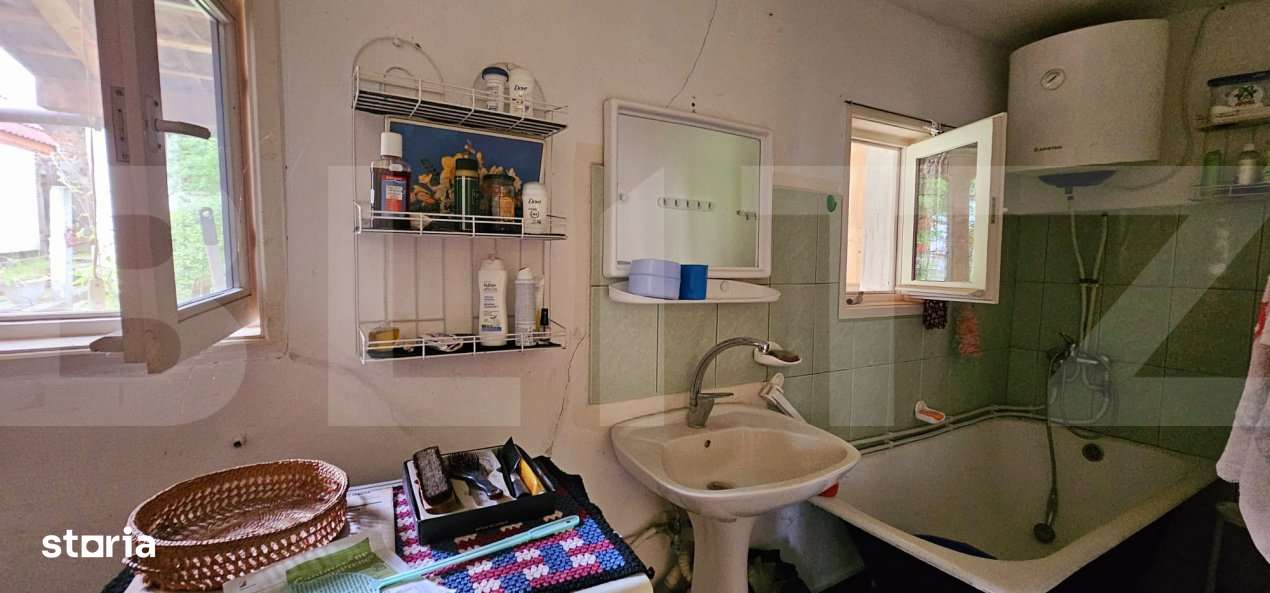 Casa traditionala din lemn, cu teren de 600 mp. - Bodoc - Imagine principală: 5/8