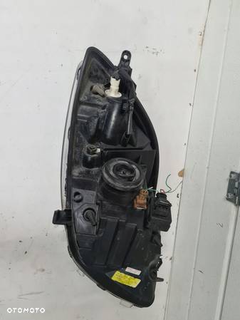 Lampa przednia lewa Toyota Yaris II lift - 6