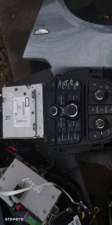 Radio panel Opel Astra J  20983513 - 1