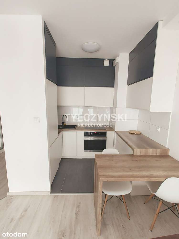 Mieszkanie z balkonem i miejscem postojowym.-0