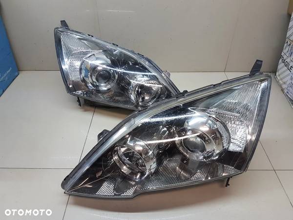 HONDA CR-V III 06-12 LAMPA PRZEDNIA LEWA LUB PRAWA PRZOD - 1