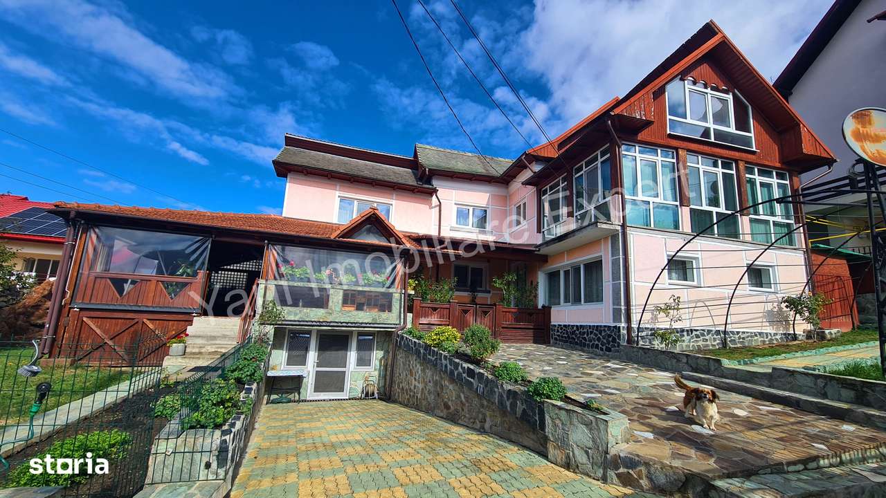 Casă de vânzare în Curtea de Argeș. - Imagine principală: 1/20