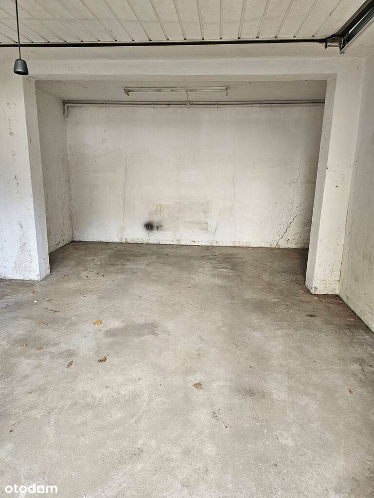 Garaż w bryle budynku przy Zygmunta Starego - Pełny obrazek: 2/4