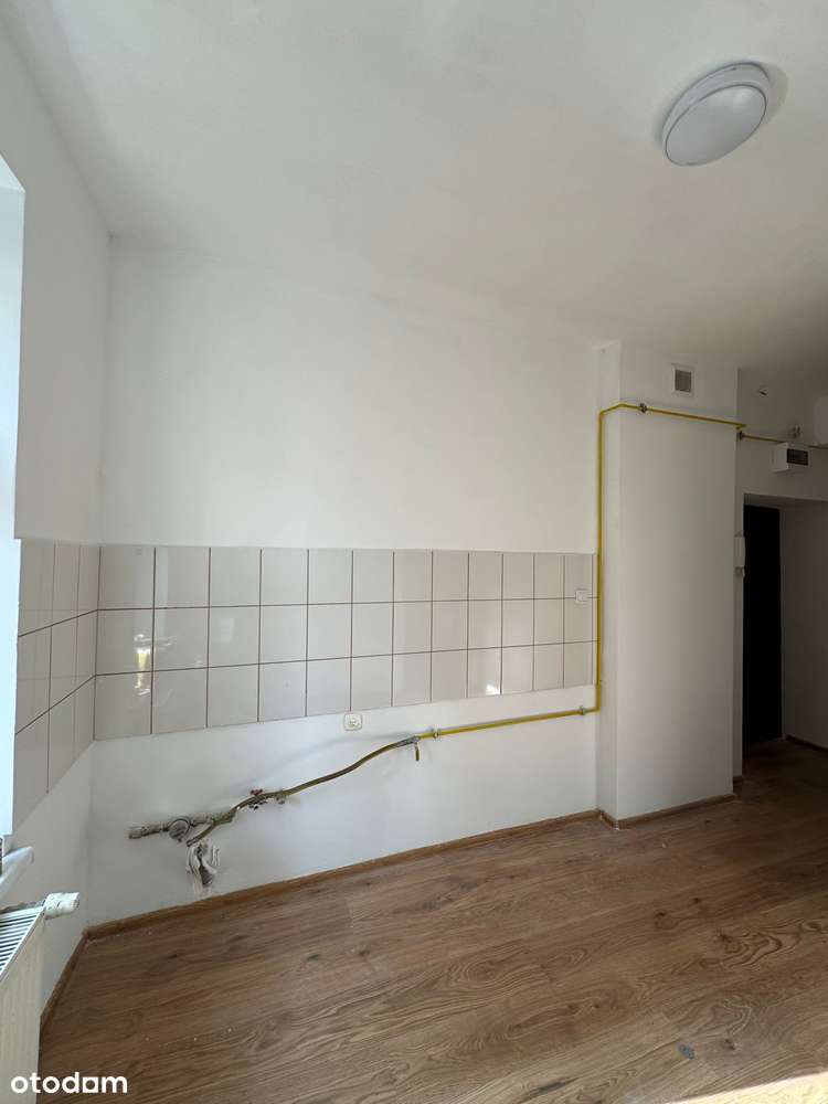 Wynajęta kamienica - 15 mieszkań, po remoncie-11