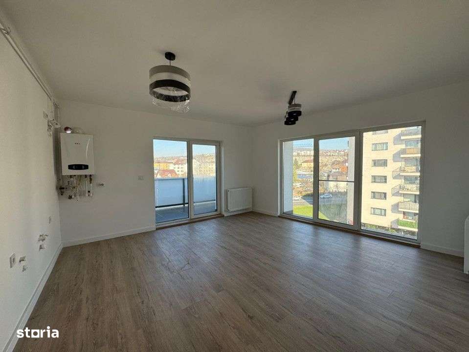 Apartament finisat 4 camere, 2 bai, 93,3 mp utili, etaj retras, Dambul - Imagine principală: 3/19
