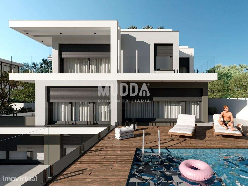 Moradia isolada de design contemporâneo nos Casais Mestre Mendo-9