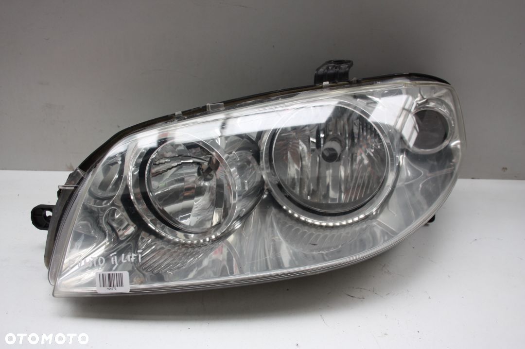 Lampa przednia lewa europejska oryginalna FIAT PUNTO II FL LIFT - 1