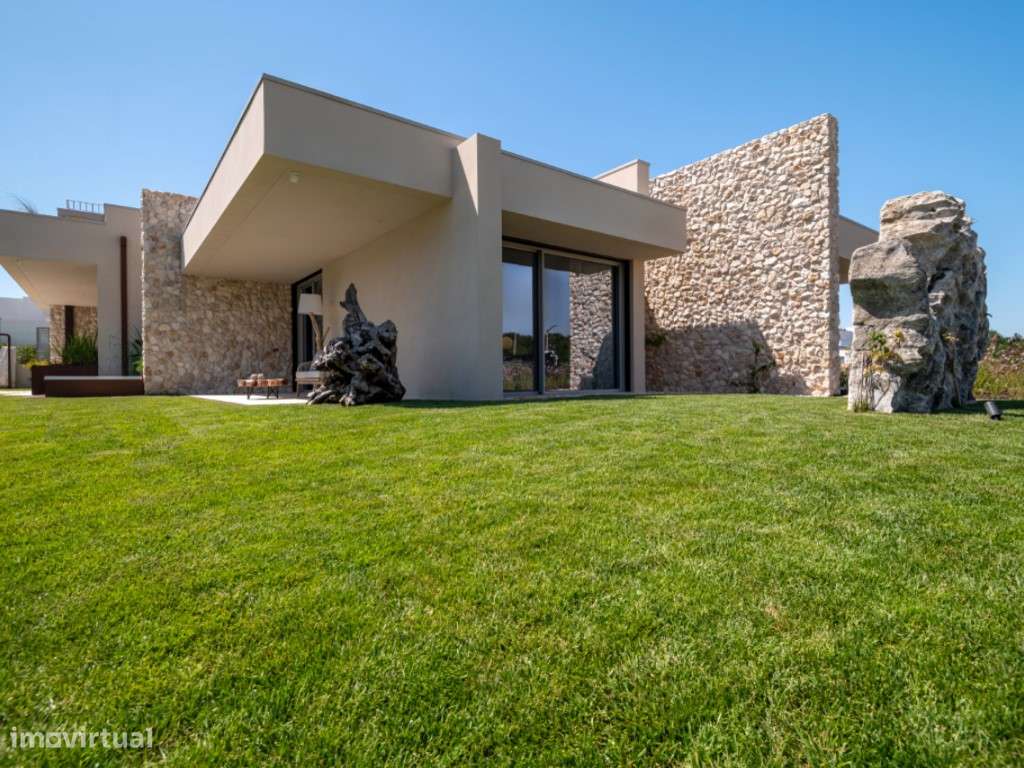 Moradia de extraordinária qualidade junto à lagoa, golfe e praia-31