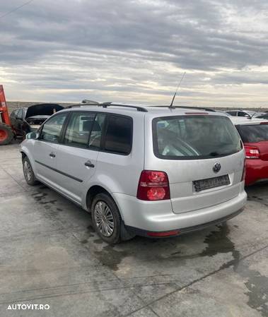 Amortizor fata stanga Volkswagen VW Touran 1 (facelift)  [din 2006 pana  2010] seria Minivan 5-usi - 2